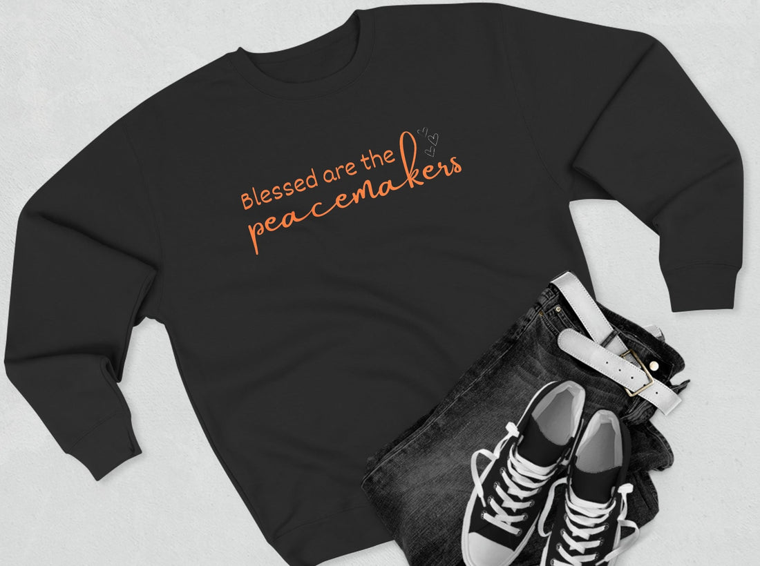 Blessed are the Peacemakers, Unisex Crewneck Christian Sweatshirt laying flat black